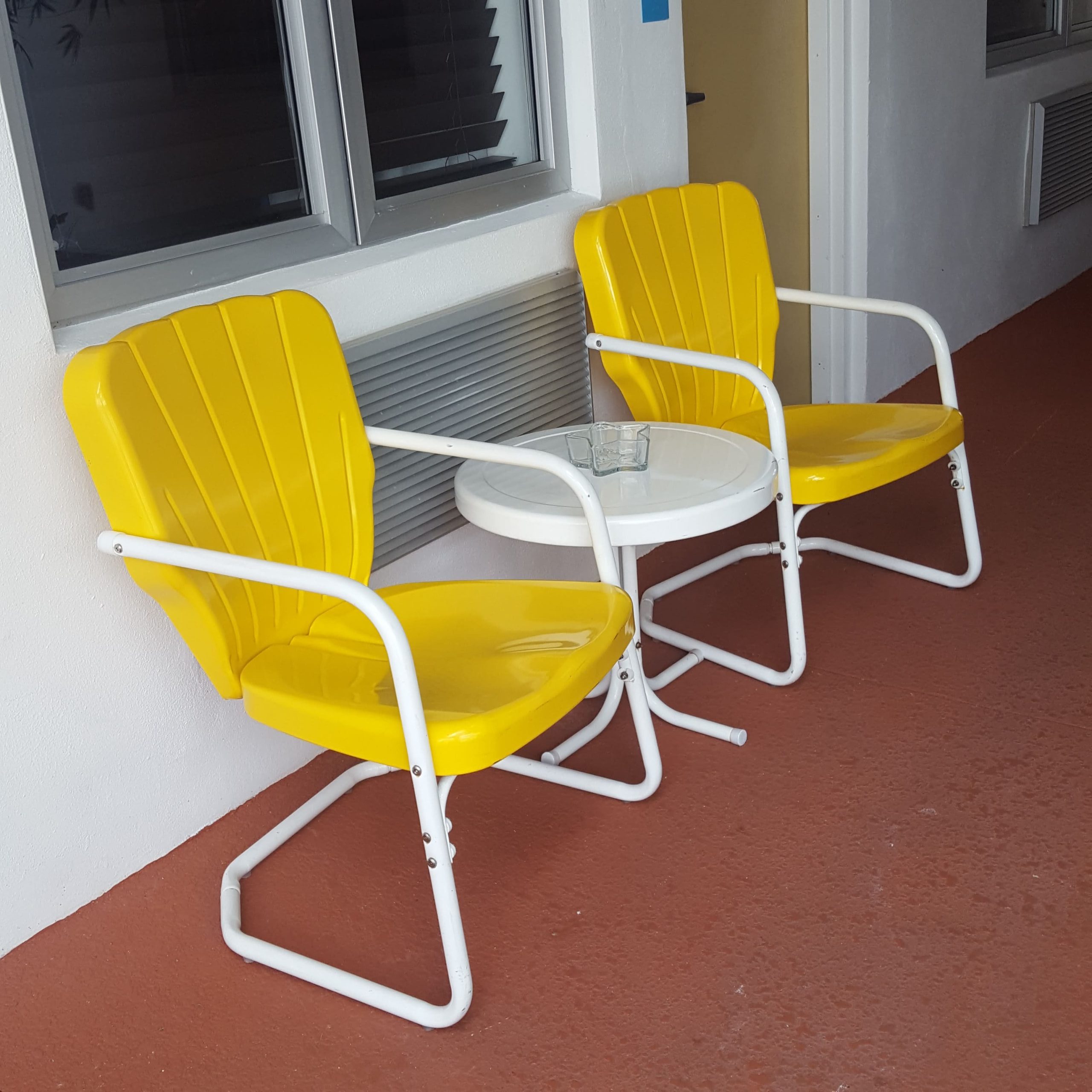office furniture stacking chairs stored compactly